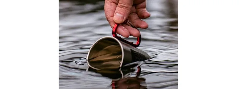 Lifestyle shot using a carabiner mug 