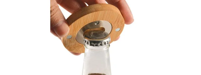 Opening a bottle with a bottle opener
