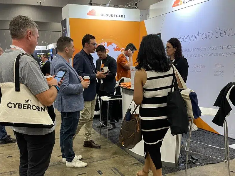 Personalised Brand Activation visitors Personalised Brand Activation with visitors chatting by the stand