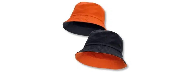 Orange and black reversible bucket hats