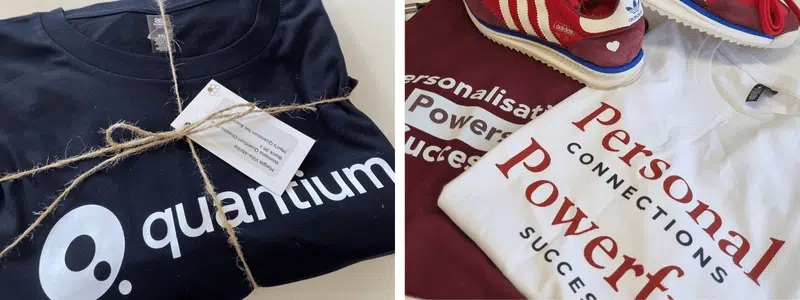 Custom printed shirts featuring brand messages and logo designs.