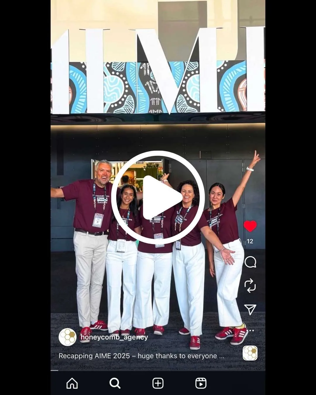 Honeycomb Agency team at AIME 2025 in front of AIME sign, Instagram Reel preview