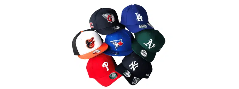 Assorted varsity-style caps with embroidered logos