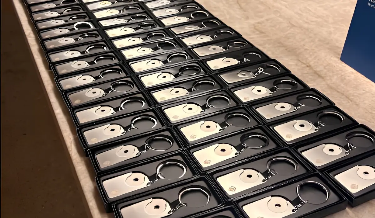 Dozens of boxed personalised keyrings lined up ready for guests at a brand activation giveaway