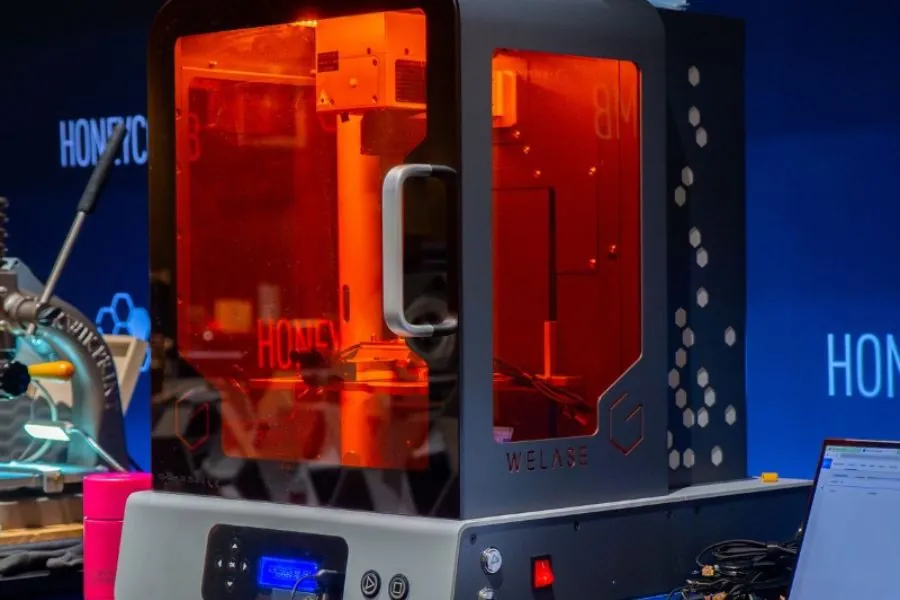 Engraving machine Laser engraving machine at a Honeycomb brand activation stand