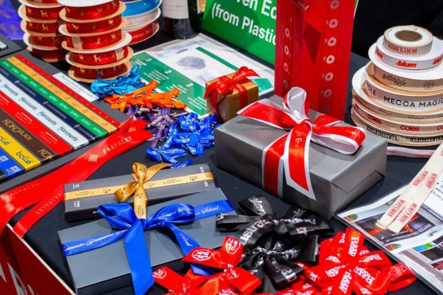 Promotional Products Promotional products and gift boxes tied with branded ribbons